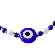 Bracelet with blue and white beads on a white background