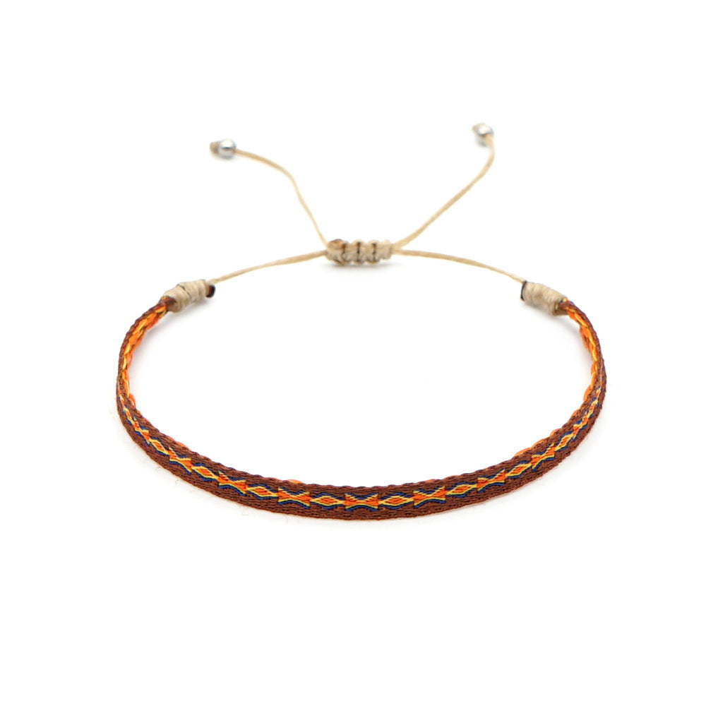 Mallorca woven bracelet with soft tones and coastal-inspired bohemian design.