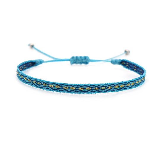 Santorini woven bracelet featuring blue tones and bohemian design.