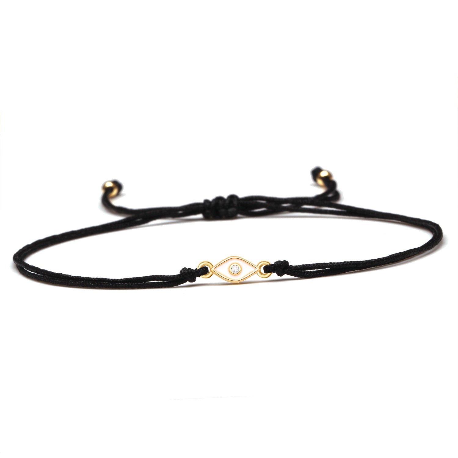 Rope Eye Bracelet in black cord with golden eye charm and white crystal centerpiece