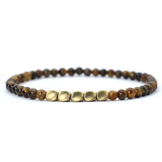 Beaded bracelet with deep brown tiger eye stones and matte gold center beads