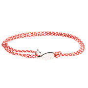 Red and white bracelet with silver whale charm