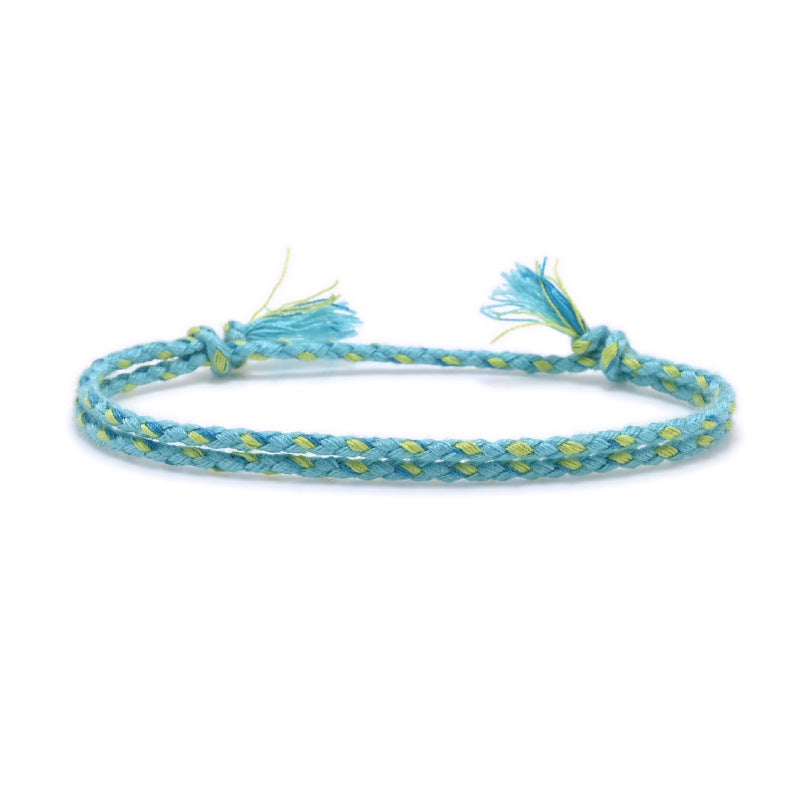 Hand-braided turquoise and lime cotton bracelet with tassel ends – Rue & Strand