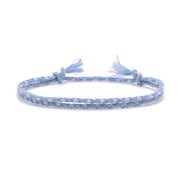 Braided cotton bracelet in sky blue and cream with tassel ends – Rue & Strand