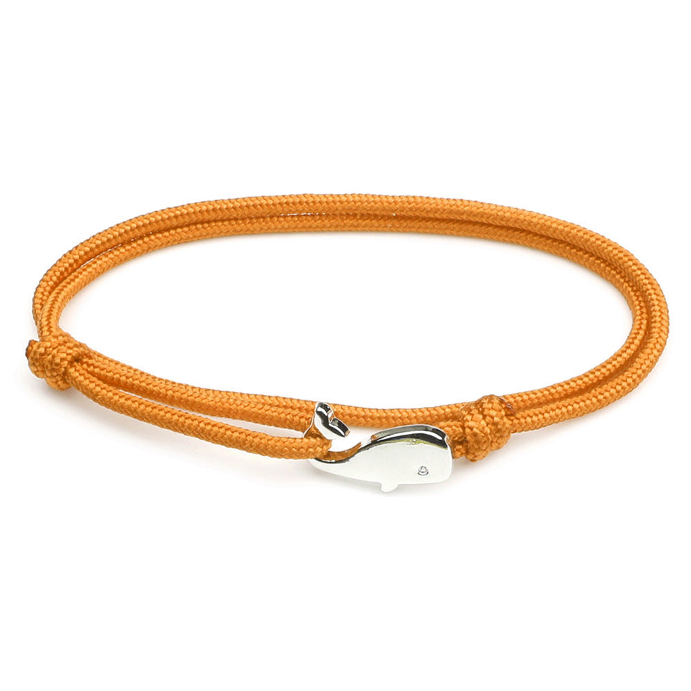 Orange cord bracelet with silver-tone whale charm