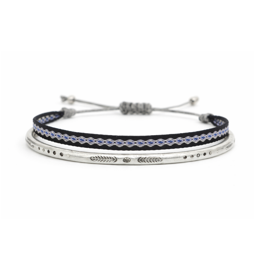 Bracelet with black and silver design on a white background