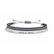 Bracelet with black and silver design on a white background