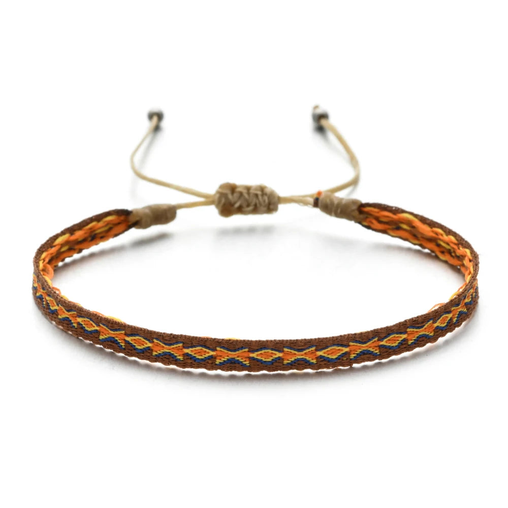 Mallorca woven bracelet with soft tones and coastal-inspired bohemian design.