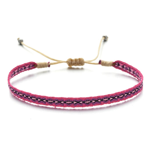 Corsica woven bracelet featuring earthy colors and bohemian design.