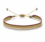 Minimalist handmade bracelet in beige with gold and burgundy trim and adjustable closure.