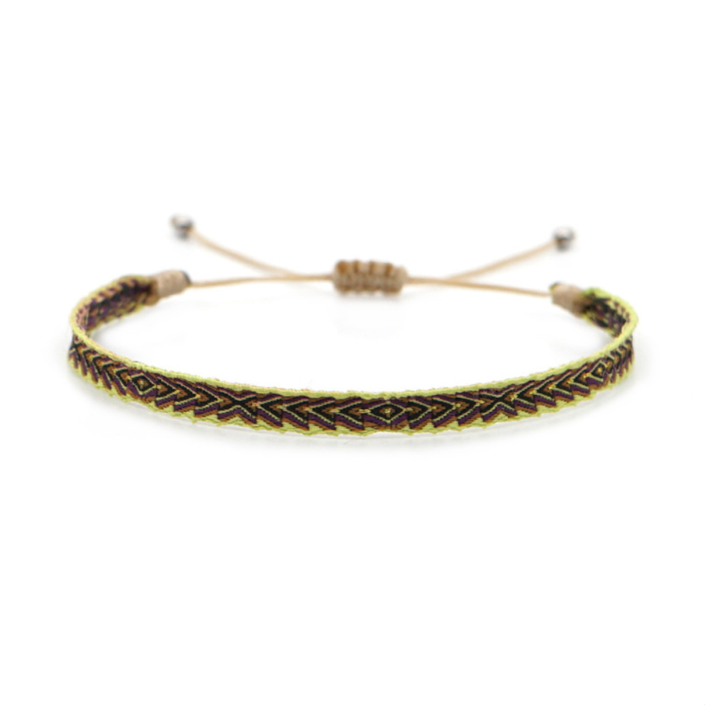 Woven bracelet with dark brown and neon green zigzag arrow pattern, beige adjustable drawstring