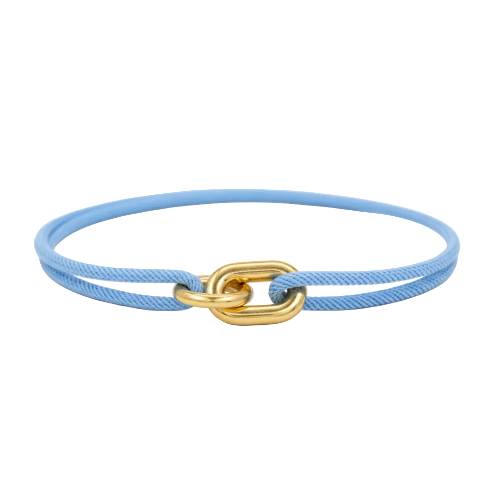 Light blue bracelet with a gold clasp on a white background