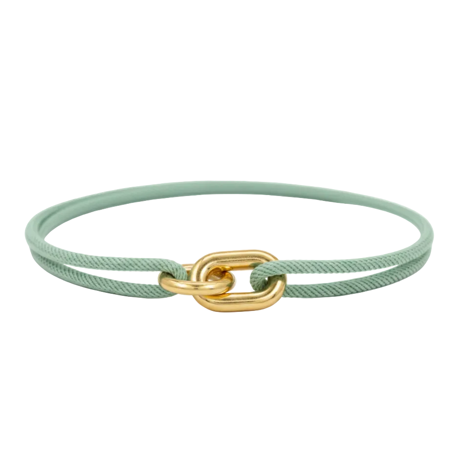 Mint green bracelet with a gold clasp on a white background