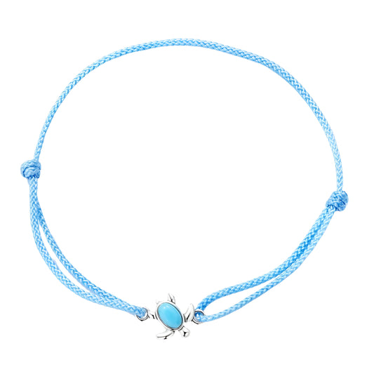 Blue braided bracelet with a silver charm on a white background, featuring '925 Sterling Silver' stamp.