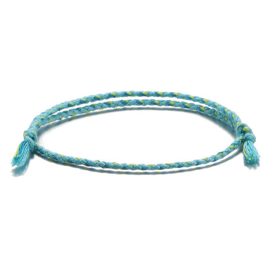 Serenity bracelet featuring handcrafted Tibetan string and minimalist design.