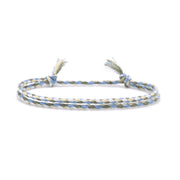 Braided friendship bracelet in sage, blue, and off-white cotton with tassel ends – Rue & Strand