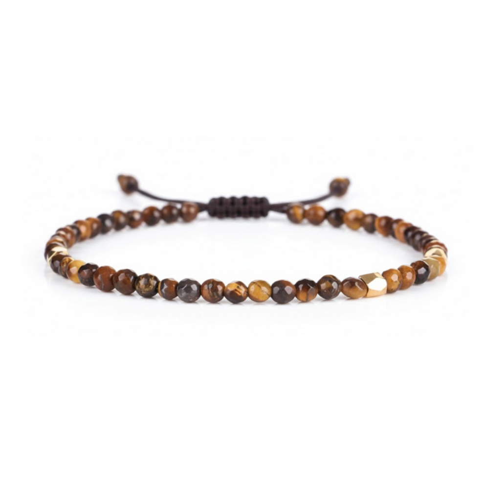 Beaded bracelet with brown and gold beads on a white background